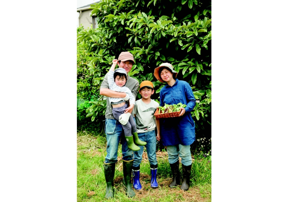 Sons Tatsuki (3) and Keigo (9) with their parents.